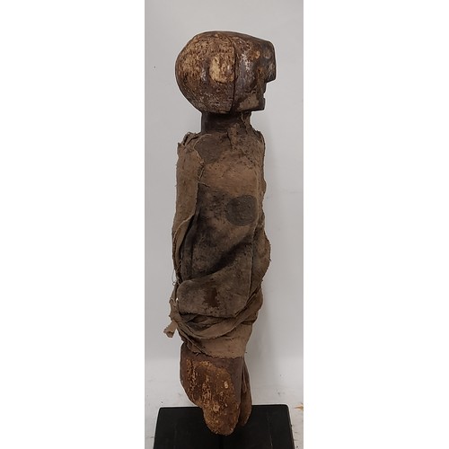 416 - FON Fetish Figure on Stand with remains of Blue pigment to face, 47cm high x 12cm wide