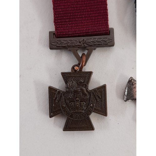 174 - 2 x Military Miniature Medal replicas, the Victoria Cross and Distinguished Service Cross