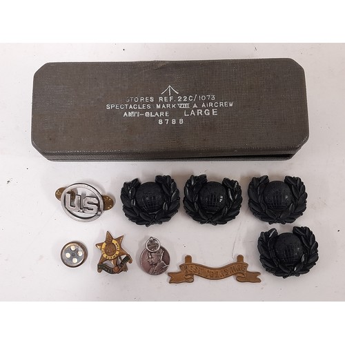 197 - Military Air Crew Specs Case with Broad Arrow and a collection on badges and Insignia and a small Es... 