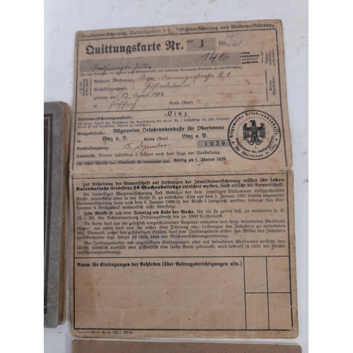 313 - German WW2 Period ephemera, 2 x work books, invalid Fund Contribution Card with Stamps, German Volks... 