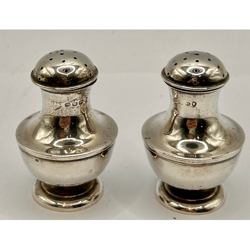 10A - Two Silver Hallmarked Pepperets. 5cm x 3cm, 39.55Grams.  (2)