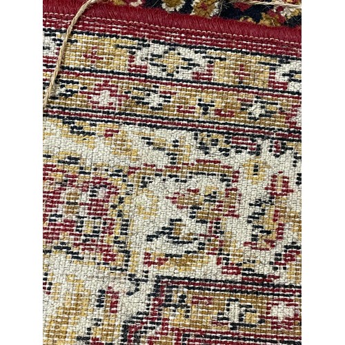 441 - Decorative Hand Tied Rug With Central Pattern. 182 x 140 cms