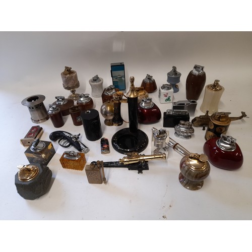 276 - 34 x Collectable Table Lighters