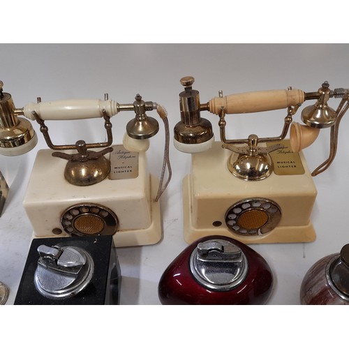 282 - 18 x Collectable Table top Lighters including 2 in the tyle of telephones.