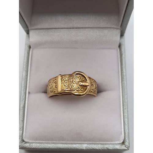 493 - 9ct gold Buckle Ring in box Size R, 3.8 gram