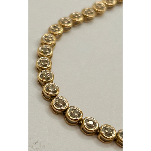 503 - 9Ct Gold And Diamond Tennis Bracelet . 8cm, 6.25Grams