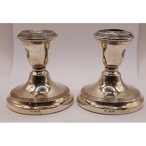 548 - Pair of Silver Hallmarked Candlesticks with weighted bases, 9.5cm high total weight 445.7 grams