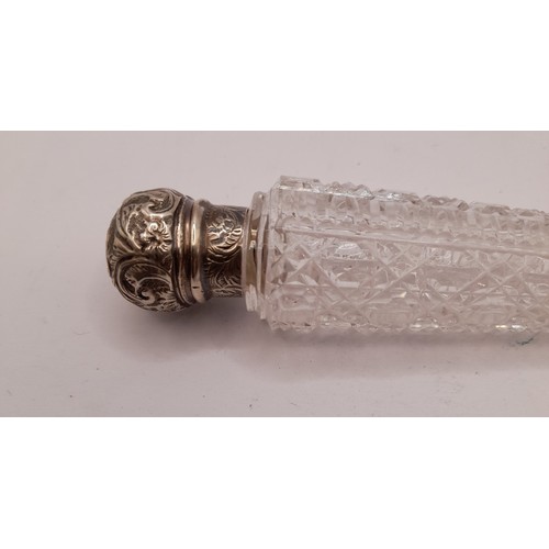 562 - Glass Cut lay down Perfume Bottle with silver hallmarked lid, 17.5cm long