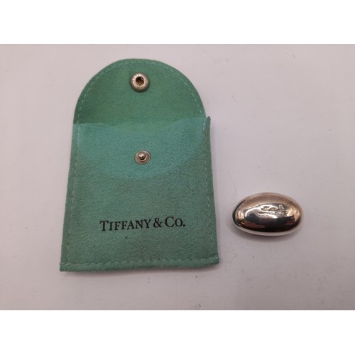 572 - Tiffany & Co Sterling Silver Bean Paperweight in Pouch, weight 5.9grams grams