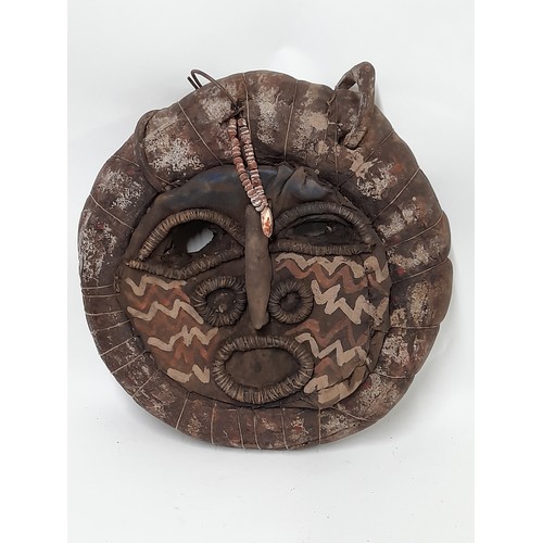 150 - Tribal Mask circular Painted Leather with Iron Rings, 36cm diameter