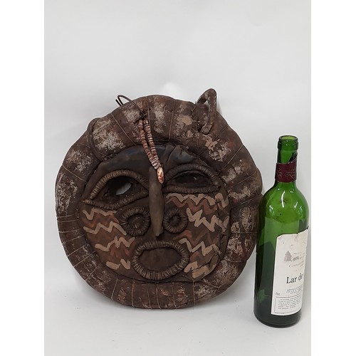 150 - Tribal Mask circular Painted Leather with Iron Rings, 36cm diameter