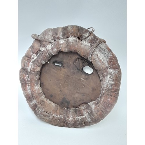 150 - Tribal Mask circular Painted Leather with Iron Rings, 36cm diameter