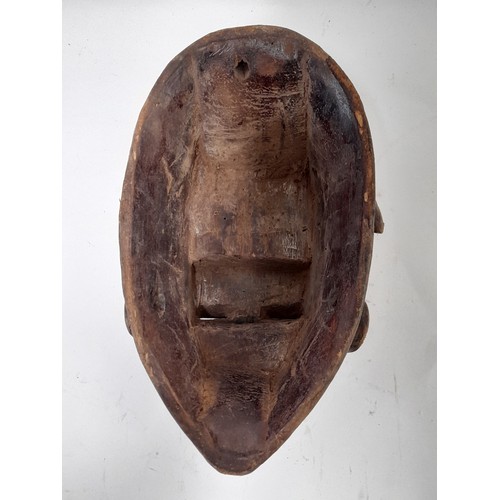 158 - Tribal Punu Face Mask, White Faced Carved wood Mask with Red Detail, 30cm x 18cm