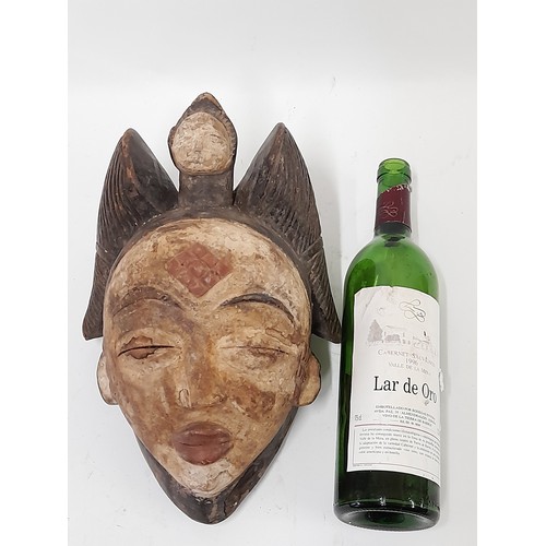 160 - Tribal Mask, White Face Carved wood mask With winged head  dress, 30cm x 21cm