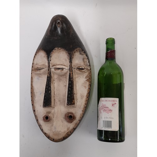 162 - Tribal Mask, Carved Face Mask with 3 eyes, 2 noses and 2 mouths, Black and White, 35cm x 18cm