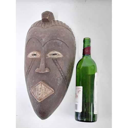 163 - Tribal Mask, Long carved Face Mask with white eyes and mouth, 39cm x 20cm