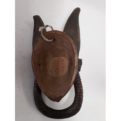 173 - Tribal Mask, Carved wood mask with horns, 39cm x 18cm