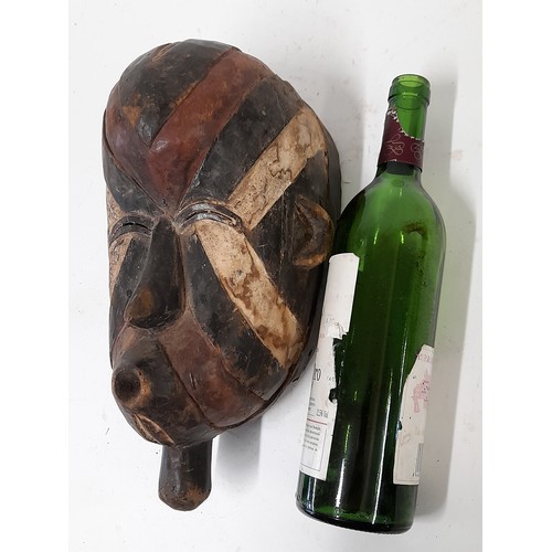 175 - Tribal Mask, Carved wood mask with Red, white and black stripes, 33cm x 18cm