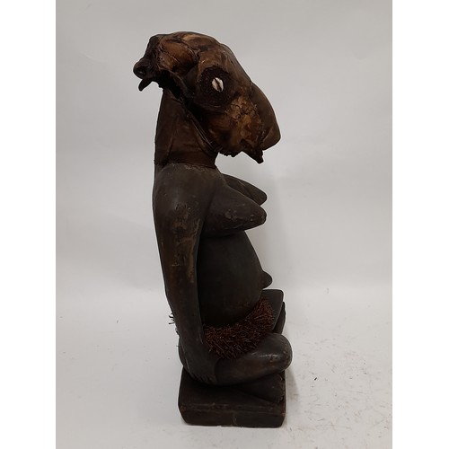 183 - Tribal Figure, Large free standing Fetish Female Figure with animal skull, 53cm high