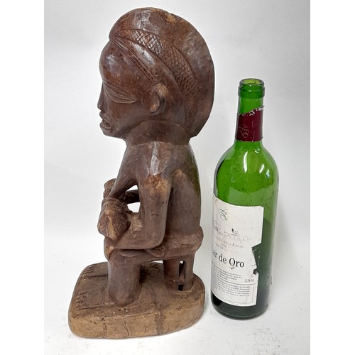 190 - Tribal Figure, Carved wood Figure of a woman Breastfeeding a Baby, 40cm high