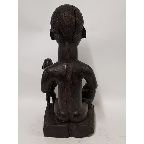 191 - Tribal Figure, Carved Wood Female Figure with child and Drum, 43cm high