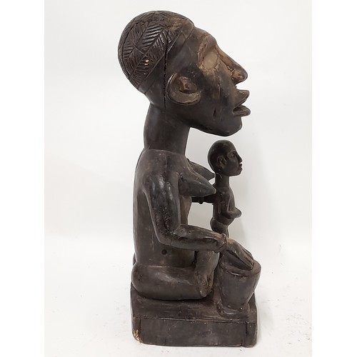 191 - Tribal Figure, Carved Wood Female Figure with child and Drum, 43cm high