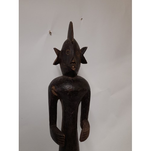 194 - Tribal Figure, Very Tall carved wood figure on plinth standing 102cm high