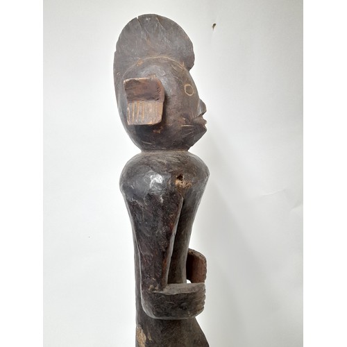 194 - Tribal Figure, Very Tall carved wood figure on plinth standing 102cm high