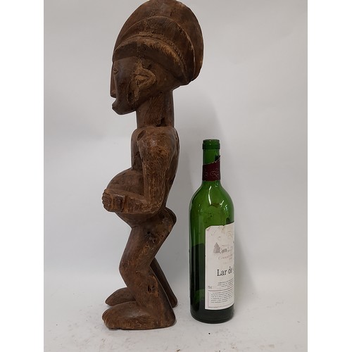 196 - Tribal Figure, Carved wood Female Figure, 52cm high