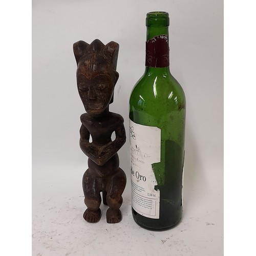 212 - Tribal Figure, Carved wood figure, 27cm high