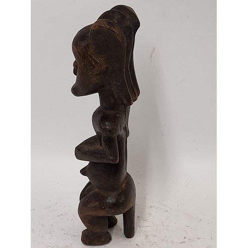 212 - Tribal Figure, Carved wood figure, 27cm high