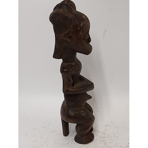 212 - Tribal Figure, Carved wood figure, 27cm high