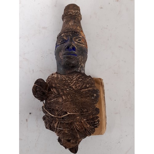 223 - Tribal Figure, Carved wood Cloth bound Fetish figure with Blue face, 22cm long