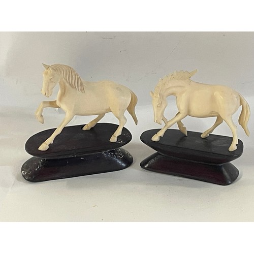 56 - Two Chinese Horse Figures Mounted On Wood Bases. (2)