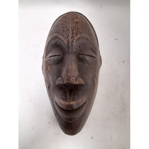 241 - Tribal, Large Carved wood Tribal Mask, 35cm x 19cm