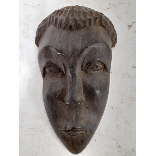 243 - Tribal Small Heavy Carved Wood Mask, 20cm long