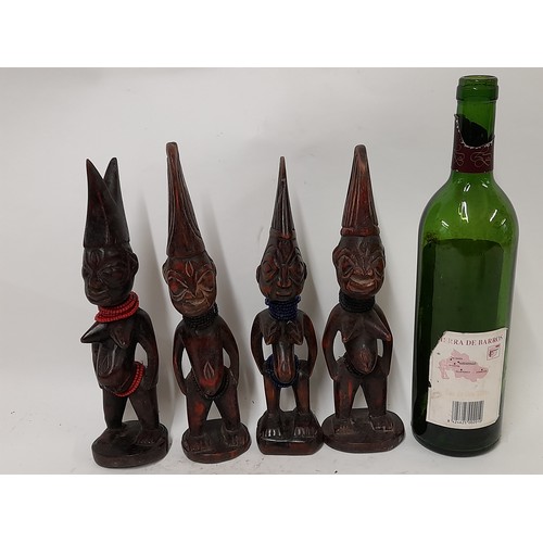 248 - 4 x Small carved wood Tribal figures, tallest 27cm high