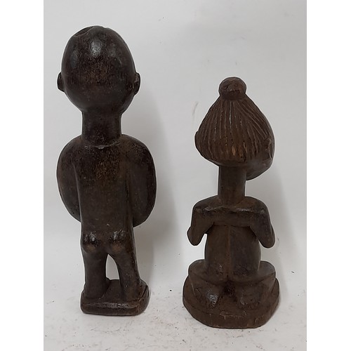 249 - 2 Tribal Carved wood Figures, tallest 28cm