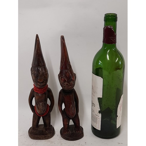 252 - 2 x carved wood Tribal Figures with Beads around their neck, 27cm tall