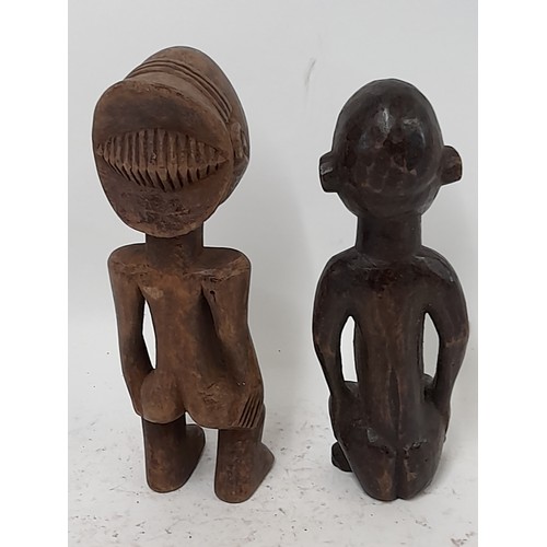 253 - 2 x Carved wood Tribal Figures, one carved as a drinking vessel, tallest 30cm high