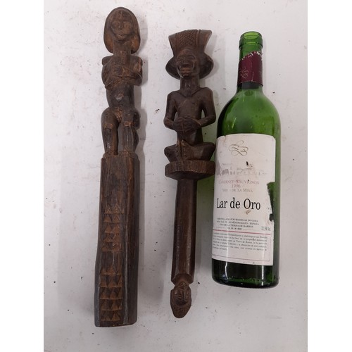 256 - 2 x carved wood Tribal Figures on Pedestal, longest 39cm