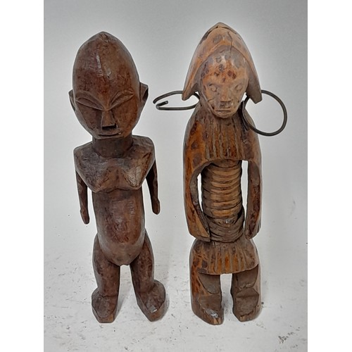 257 - 2 x Carved wood Tribal Figures, one with metal earings 23cm high