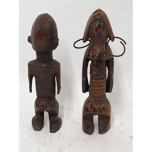 257 - 2 x Carved wood Tribal Figures, one with metal earings 23cm high