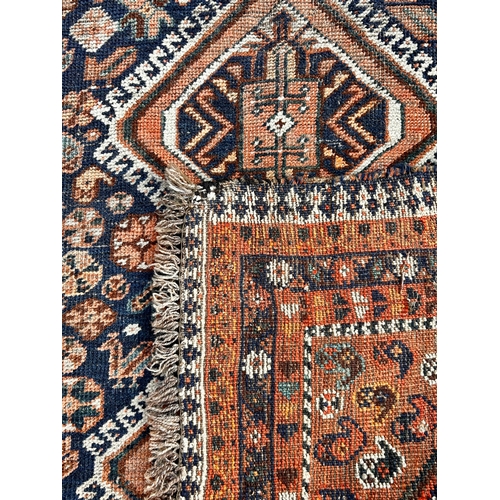 32 - Decorative Hand Made Rug. 149cm x 106cm.