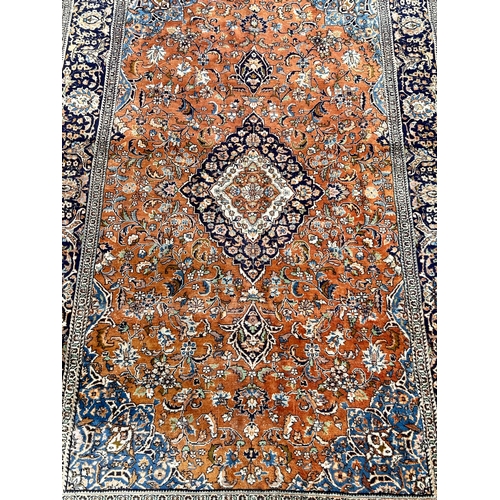 33 - Decorative Hand Made Rug. 227cm x 140cm.