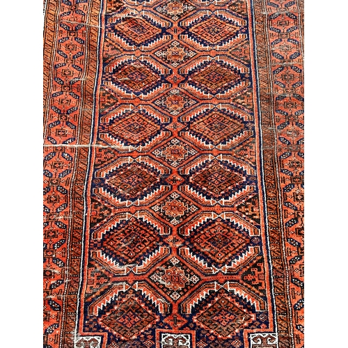 35 - Decorative Hand Made Rug. 173cm x 97cm.