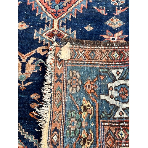 36 - Decorative Hand Made Rug. 196cm x 123cm.