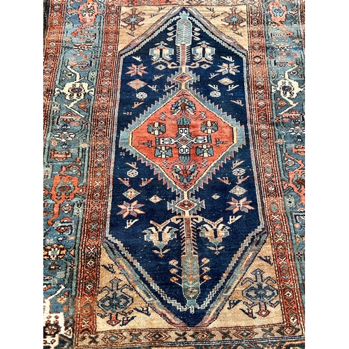 36 - Decorative Hand Made Rug. 196cm x 123cm.