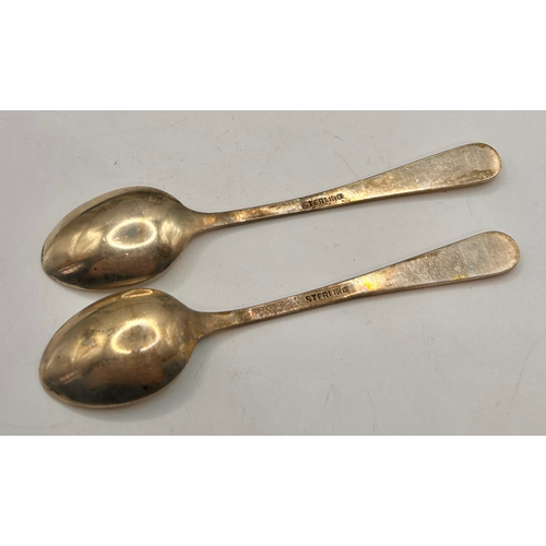 41 - Eleven Sterling Silver Decorative Tea Spoons In Box. 9.5cm x 2cm, Total 76.8Grams.  (11)