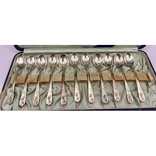 41 - Eleven Sterling Silver Decorative Tea Spoons In Box. 9.5cm x 2cm, Total 76.8Grams.  (11)